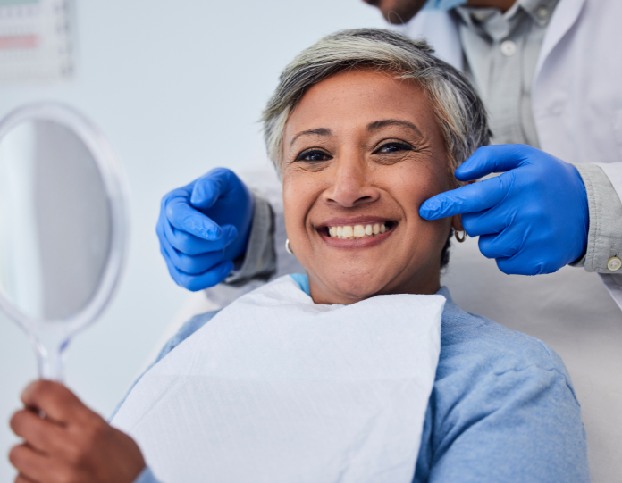 adult smiling at the dentist