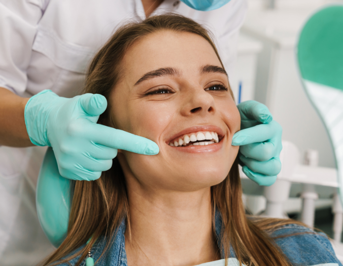 woman smiling post chipped tooth repair